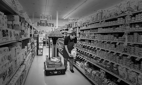 One Man Lift, Lift-Rite SpinGo being used within a grocery store. 